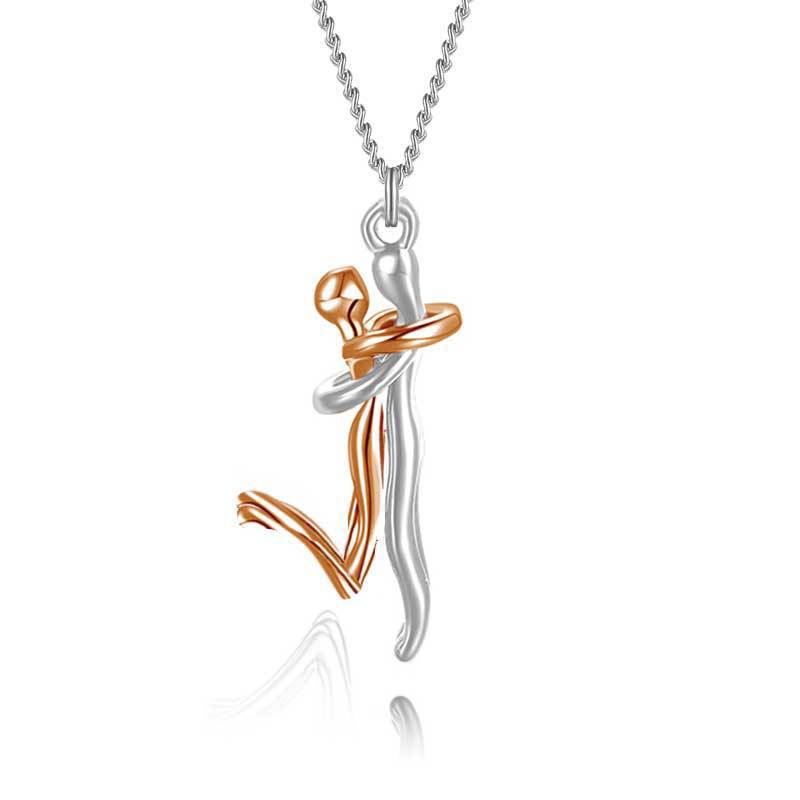 Rose gold hug pendant necklace with two figures embracing