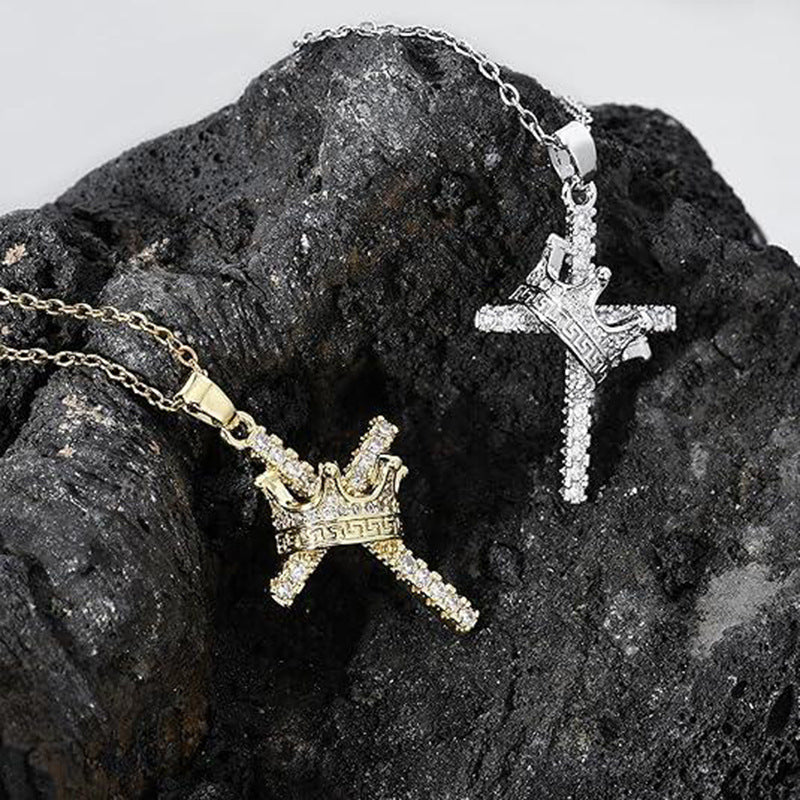 Cross and crown necklaces in gold and silver shown together